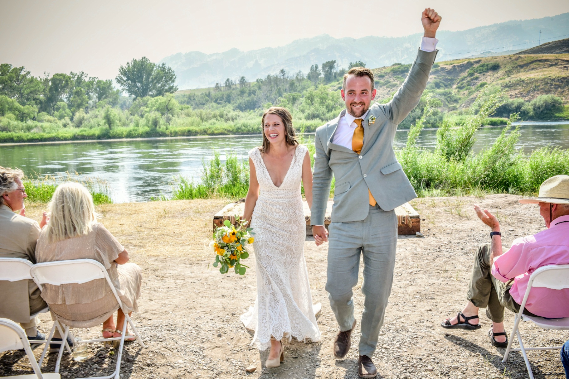 Riverside wedding ceremony recessional in Montana